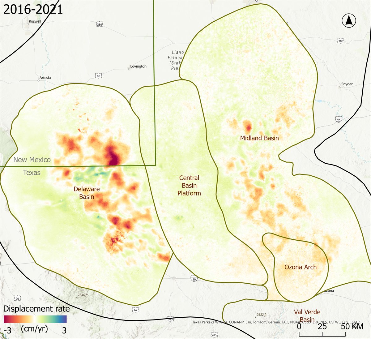 Map of average vertical ground motion across the Permian Basin from 2016 to 2021. Large areas of the Delaware Basin, straddling the Texas–New Mexico line, are red (sinking up to about 3 cm a year), with a few blue patches of uplift. The Midland Basin shows scattered orange spots; the Central Basin Platform between them is mostly stable.